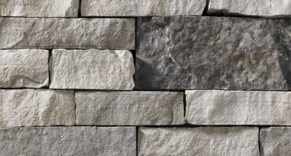 A stone veneer with a color scheme that includes a variety of greys. Perfect for any hardscape idea on the exterior or interior of any home or landscape.