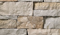 A light grey and tan stone veneer perfect for any hardscape idea on the exterior or interior of any home or landscape.