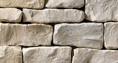 A grey stone veneer with a tumbled texture and a few tan accents perfect for any hardscape idea on the exterior or interior of any home or landscape.