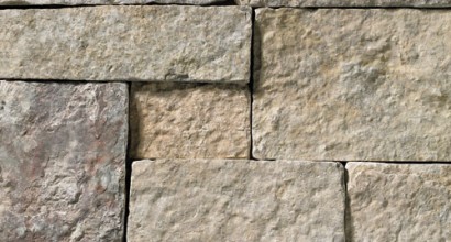 A tumbled cool-grey stone veneer with subtle tan accents perfect for any hardscape idea on the exterior or interior of any home or landscape.