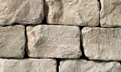 A grey stone veneer with a tumbled texture and very subtle tan hue perfect for any hardscape idea on the exterior or interior of any home or landscape.