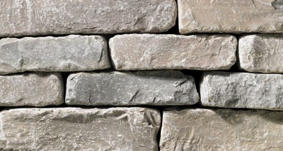 A light grey stone veneer with very subtle tan accents perfect for any hardscape idea on the exterior or interior of any home or landscape.