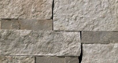A grey stone veneer with darker grey accents and a few sparse, subtle tan tones perfect for any hardscape idea on the exterior or interior of any home or landscape.