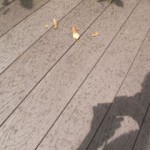 images of defective Trex decking showing mildew spots or some sort of secretion.