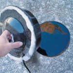 a porthole pond de-icer