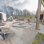 Installing a paver patio, valencia fire pit, and sitting walls in Waynesville, OH using products from Belgard and Techo-Bloc.