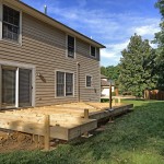 Constructing the framing for a new TimberTech Earthwood Evolutions Terrain deck.