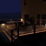 rendering of a project at night with lighting installed along with a deck with built-in planter box.